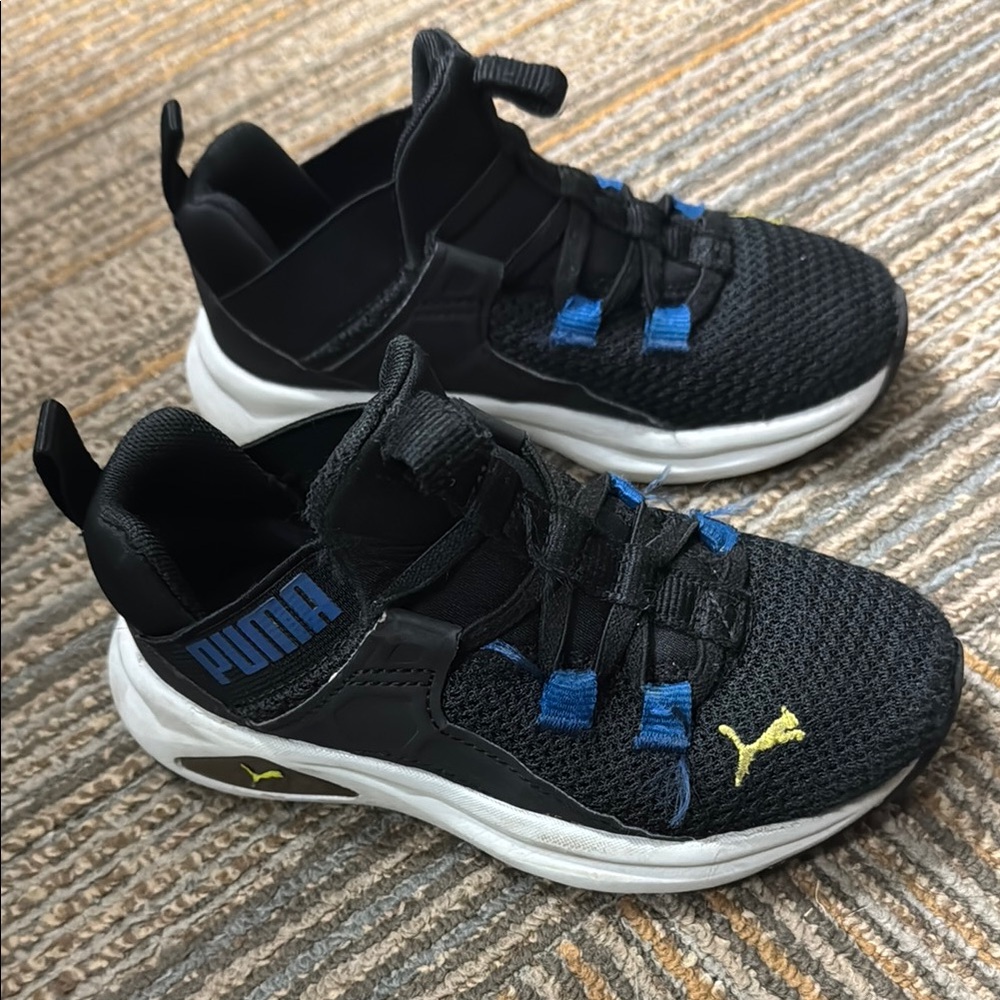 Puma Kids Black Sneakers with Blue Highlights